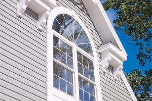 Well made arch window on a home